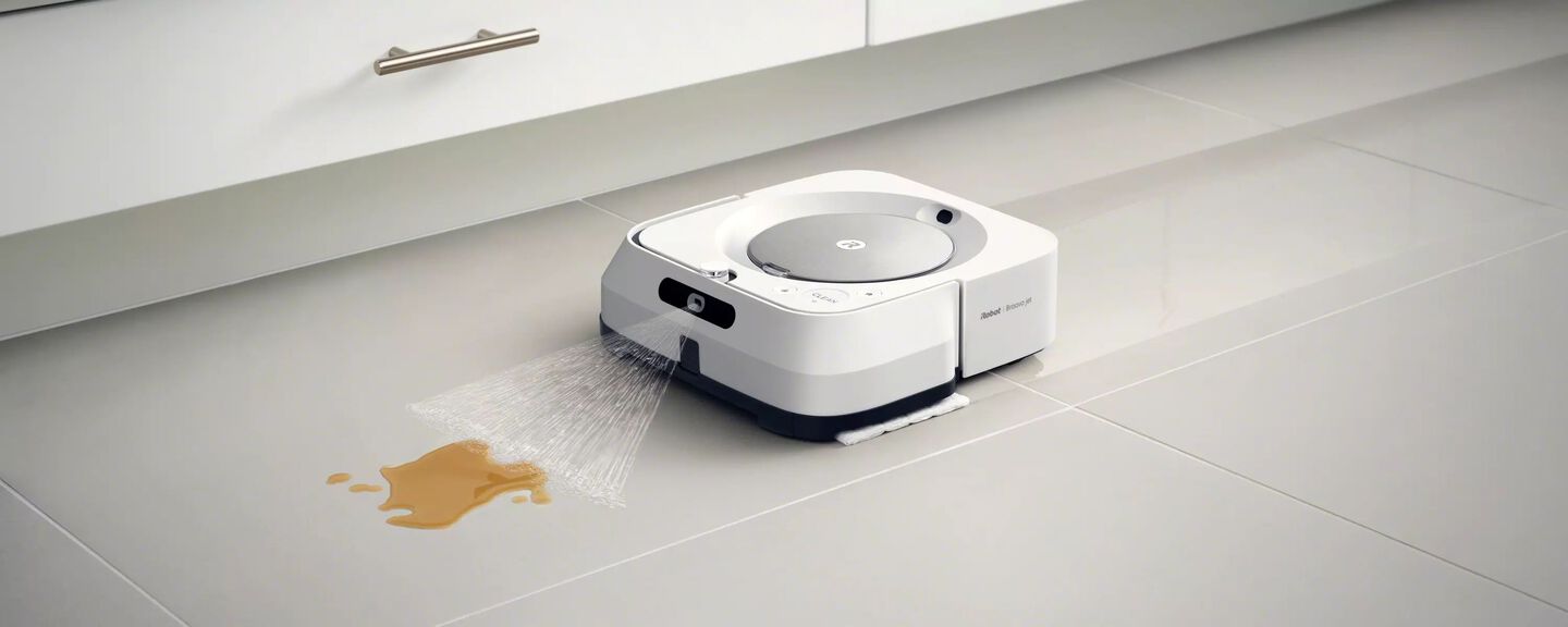 A White M6 Braava Cleaning Liquid Off A Floor