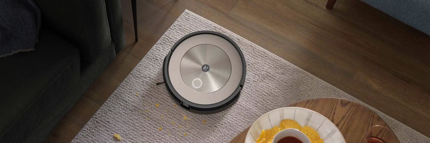 Roomba® j9 vacuuming the carpet