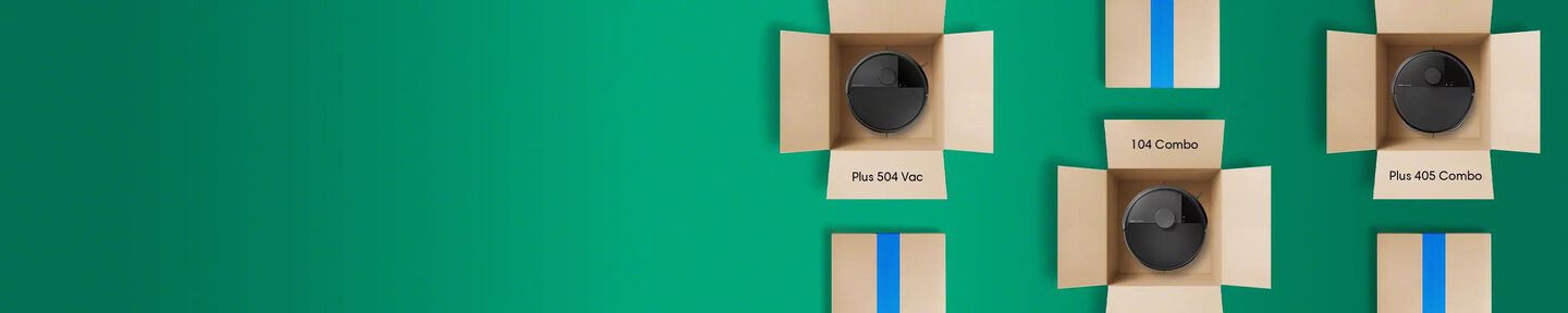 Prime Day Roomba Robots in boxes. Box on the left contains a robot labeled Roomba Plus 504 Vacuum. The box in the middle contains the a robot labeled Roomba 104 Combo Robot. The Box on the right contains a robot and is labeled Roomba Plus 405 Combo. 