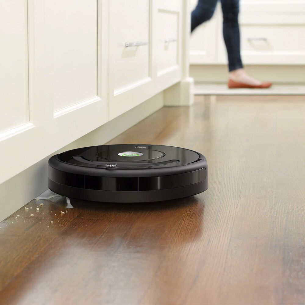 Roomba 675 vacuuming hardwood floor