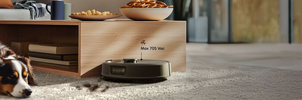 Roomba&reg; robot cleaning up pet hair.