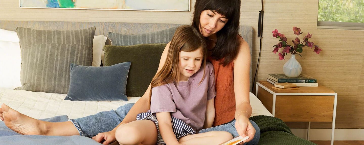 Girl and Mom reading