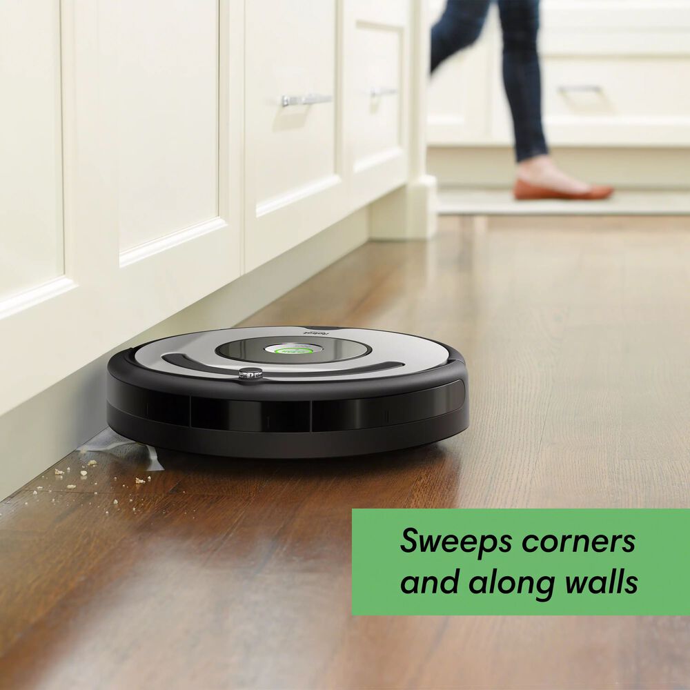 Roomba 677 vacuuming hardwood floor