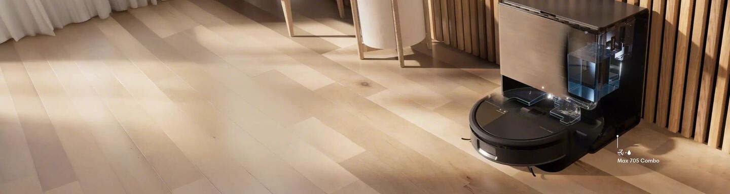 Roomba Max 705 Combo Robot Vacuum and Mop in dock.